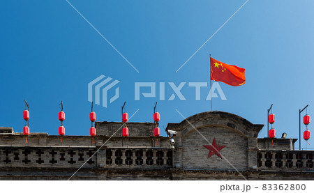Chinese flag on an old building in Beijing, China Chinese flag on an old building in Beijing, China 83362800