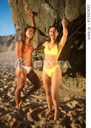 Happy friends at beach party Happy friends at beach party 83362852