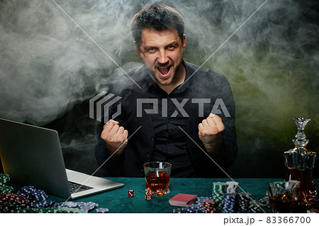 Bearded online casino player man celebrating victory Bearded online casino player man celebrating victory 83366700