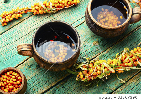 Tea with sea buckthorn berries Tea with sea buckthorn berries 83367990
