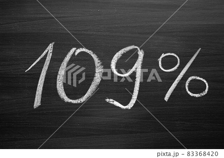 109 percent header written with a chalk on the blackboard 83368420