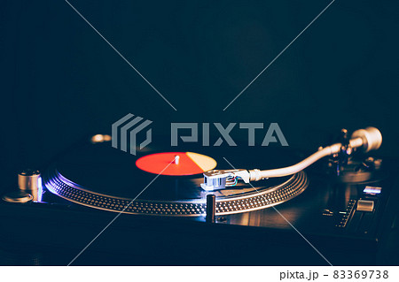 professional dj turntable with illumination, dark background 83369738