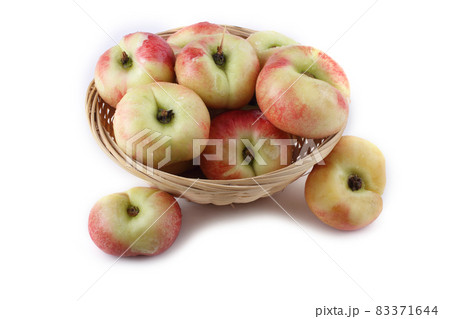 Flat peach (doughnut peach, donut peach, UFO peach, peento peach, saucer peach). Ancient Chinese variety "Pan tao". Delicacy Flat peach (doughnut peach, donut peach, UFO peach, peento peach, saucer peach). Ancient Chinese variety "Pan tao". Delicacy 83371644