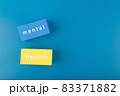 Mental health text written on colorful blue and yellow rectangles on dark blue background with copy space 83371882