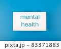 Mental health text written on white rectangle in the middle of dark blue background 83371883