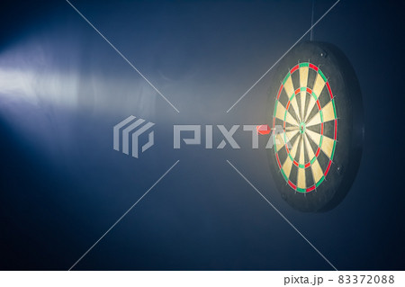 darts board illuminated with a spotlightの写真素材 [83372088] - PIXTA