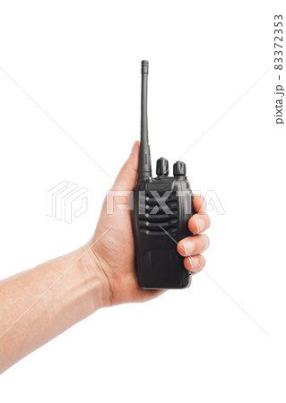 portable radio Walkie-talkie in hand, isolated on white portable radio Walkie-talkie in hand, isolated on white 83372353