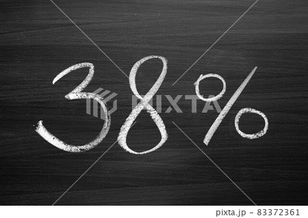 38 percent header written with a chalk on the blackboard 83372361