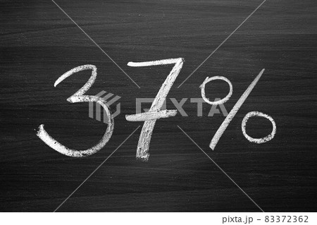 37 percent header written with a chalk on the blackboard 83372362