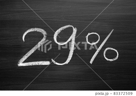 29 percent header written with a chalk on the blackboard 83372509
