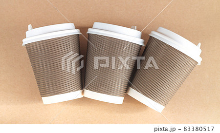 Craft biodegradable brown paper cups top view 83380517