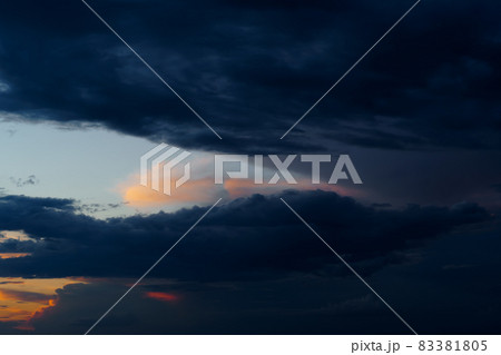 beautiful sunset sky, bright sunlight and silhouette of clouds as a background 83381805