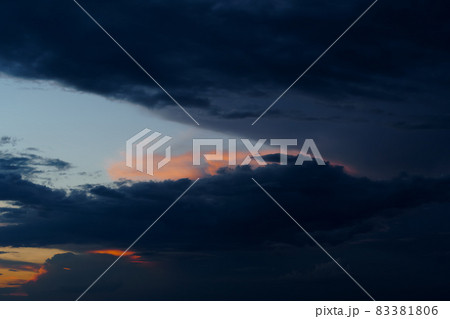 beautiful sunset sky, bright sunlight and silhouette of clouds as a background 83381806