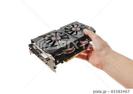 graphic video card in a hand, isolated on white 83383407