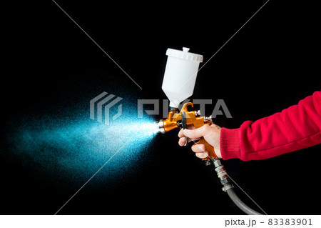 airbrush paint sprayer isolated on black 83383901