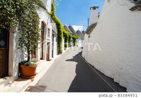Town of Alberobello, village with Trulli houses in Puglia Apulia region Town of Alberobello, village with Trulli houses in Puglia Apulia region 83384951