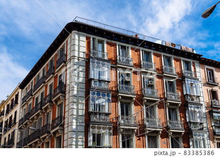 Low Angle View of Old Residential Building in Central Madrid Low Angle View of Old Residential Building in Central Madrid 83385386