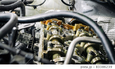 Car service auto. Automotive repair in garage workshop. Mechanic engine vehicle diagnostic. Technician maintenance. Car service auto. Automotive repair in garage workshop. Mechanic engine vehicle diagnostic. Technician maintenance. 83386239