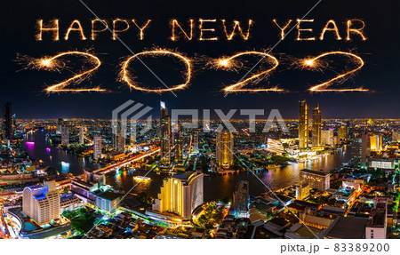 2022 happy new year fireworks over Chao Phraya river in Bangkok city at night, Thailand 83389200