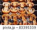 Barbecue skewers with grilled champignon mushroom kebab in a brazier 83395339