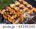Barbecue skewers with grilled champignon mushroom kebab in a brazier 83395340