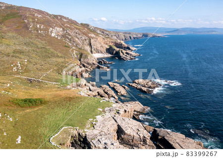 Aerial view of the coastline by Marmeelan and Falcorrib south of Dungloe, County Donegal - Ireland 83399267