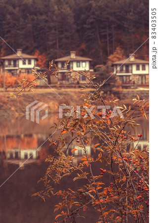 Autumn landscape with lake and houses, Bulgaria Autumn landscape with lake and houses, Bulgaria 83403505