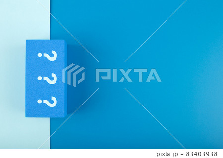 Three question marks on blue rectangle on monochromatic blue background with copy space Three question marks on blue rectangle on monochromatic blue background with copy space 83403938