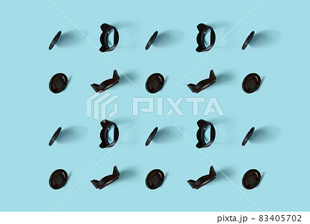A pattern of photo accessories - lens caps and lens hoods. A pattern of photo accessories - lens caps and lens hoods. 83405702