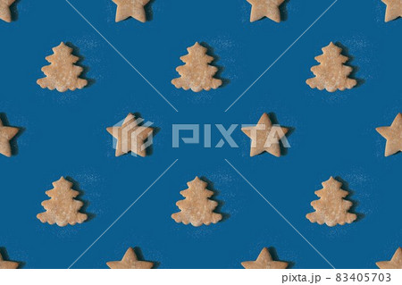 Pattern of gingerbread in the shape of stars and Christmas trees Pattern of gingerbread in the shape of stars and Christmas trees 83405703