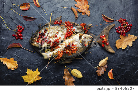 Baked fish in viburnum syrup 83406507