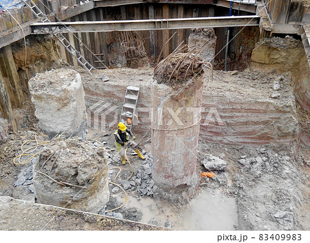 JOHOR, MALAYSIA -JUNE 16, 2015: Excavated bore pile and ready to cut to designated level at the construction site. The bore pile must cut before can fabricate the pile cap.  83409983