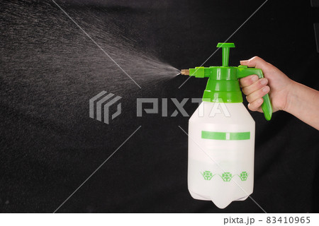 Pressure sprayer bottle in hand 83410965