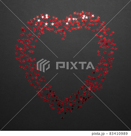 Romantic card with red glittering heart of stars. Flatlay composition. Festive mockup. Template Romantic card with red glittering heart of stars. Flatlay composition. Festive mockup. Template 83410989
