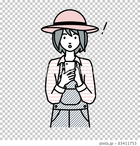 一位農婦在站立和操作智能手機時驚訝地發現了什麼 83411753