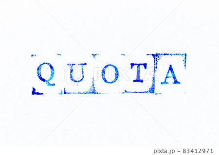 Blue color ink rubber stamp in word quota on white paper background 83412971