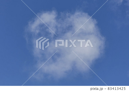 Background of a one single cumulus cloud with a blue clear sky Background of a one single cumulus cloud with a blue clear sky 83413425