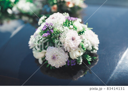 Wedding car decorated with beautiful, luxury flowers 83414131