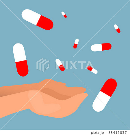 Pills falling into the hands with neutral blue background Pills falling into the hands with neutral blue background 83415037