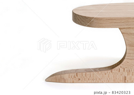 A wooden block for working with an iron, for wet-heat treatment of clothes. 83420323