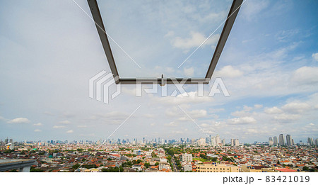 Jakarta city panorama against the background of the window pane. 83421019
