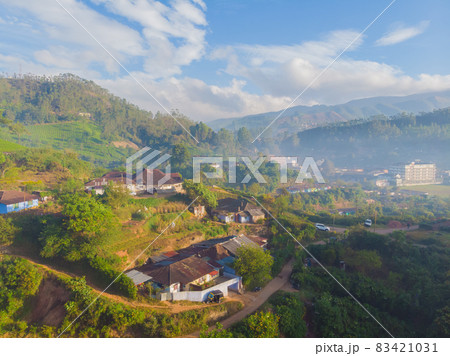Aerial view of the neighborhood of the city of Munnar. Aerial view of the neighborhood of the city of Munnar. 83421031