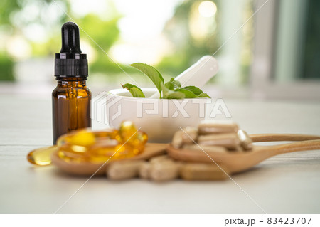 Alternative medicine herbal organic capsule with vitamin E omega 3 fish oil, mineral, drug with herbs leaf natural supplements for healthy good life. Alternative medicine herbal organic capsule with vitamin E omega 3 fish oil, mineral, drug with herbs leaf natural supplements for healthy good life. 83423707