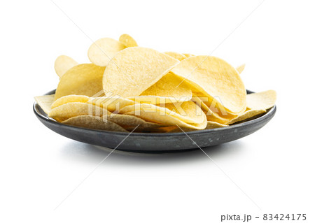 Crunchy potato chips. Potato crisps. Crunchy potato chips. Potato crisps. 83424175