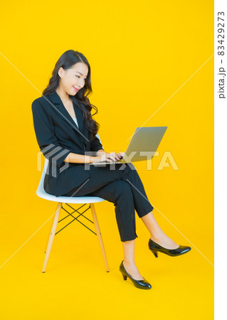Portrait beautiful young asian woman smile with computer laptop Portrait beautiful young asian woman smile with computer laptop 83429273
