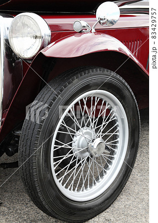 Old vintage red classic collectors car Old vintage red classic collectors car 83429757