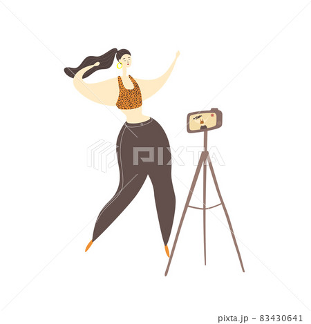 Dance challenge. Woman is dancing and recording video on camera. Young woman choreographs for her online course. Female student learns to dance online. Vector illustration in cartoon style Dance challenge. Woman is dancing and recording video on camera. Young woman choreographs for her online course. Female student learns to dance online. Vector illustration in cartoon style 83430641