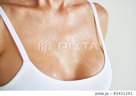 Close up woman breasts in white underwear in - Stock Photo