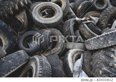 Landfill with old tires and tyres for recycling.  83433812