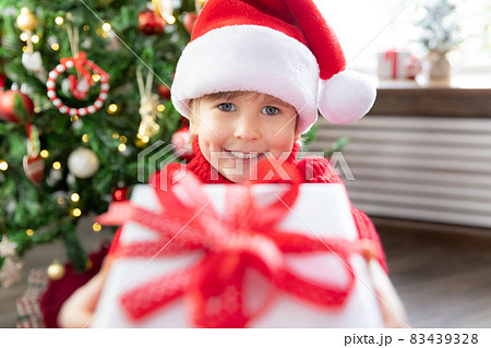Funny kid greeting in video chat. Xmas holiday concept 83439328
